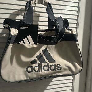 NWT Adidas Crossbody Ladies Gym Bag with lots of room inside.